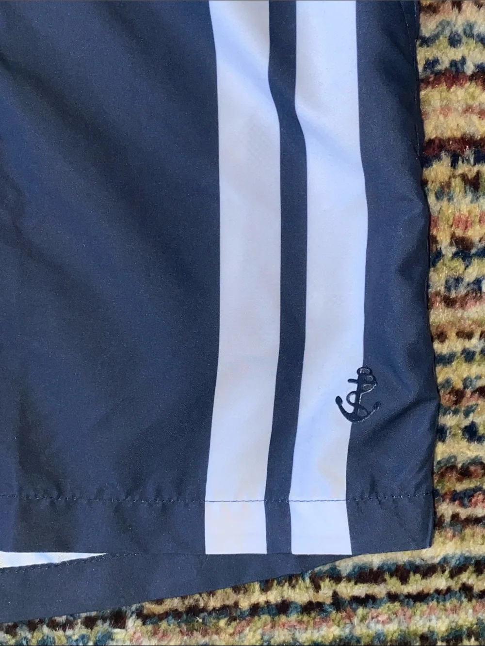 Retromarine navy swim trunks with white stripes